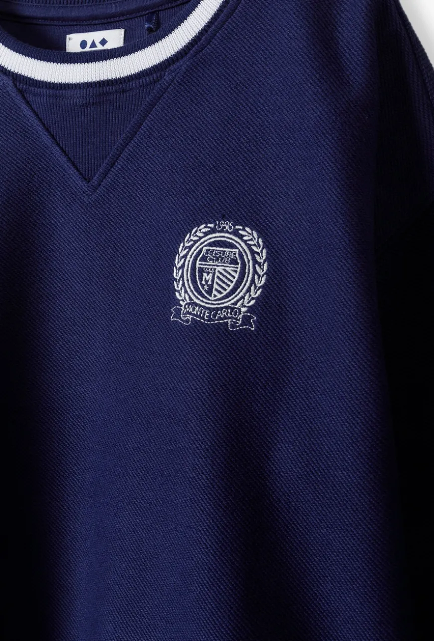 Bawełniana bluza dresowa - granatowa z naszywką