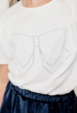 Biały elegancki t-shirt dziewczęcy z ozdobną kokardą