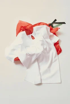 Biały elegancki t-shirt dziewczęcy z ozdobną kokardą