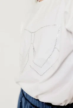 Biały elegancki t-shirt dziewczęcy z ozdobną kokardą