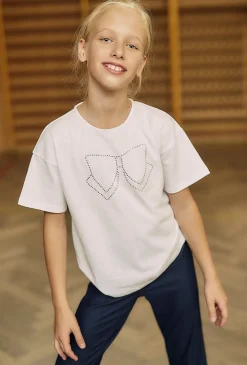 Biały t-shirt dziewczęcy z ozdobną kokardą - Max&Mia