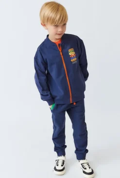 Bluza dziecięca granatowa rozpinana na stójce z nadrukiem.