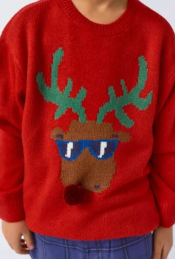 Czerwony sweter chłopięcy z reniferem i pomponem