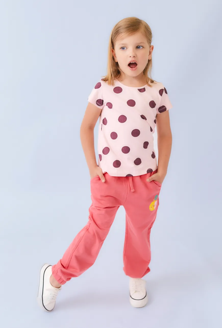 Dziewczęce spodnie dresowe comfort fit z kieszeniami