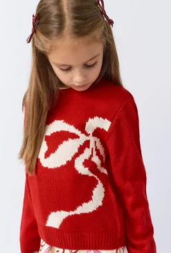 Dziewczęcy czerwony sweter z kokardą