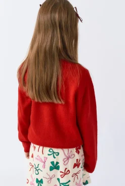 Dziewczęcy czerwony sweter z kokardą