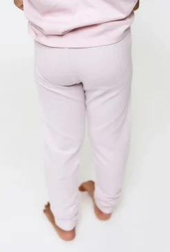 Jasnoróżowe legginsy z motylkami