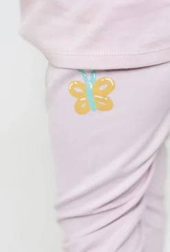 Jasnoróżowe legginsy z motylkami