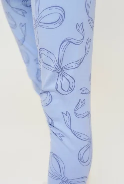 Legginsy dla dziewczynkio - niebieskie z nadrukiem wstążek