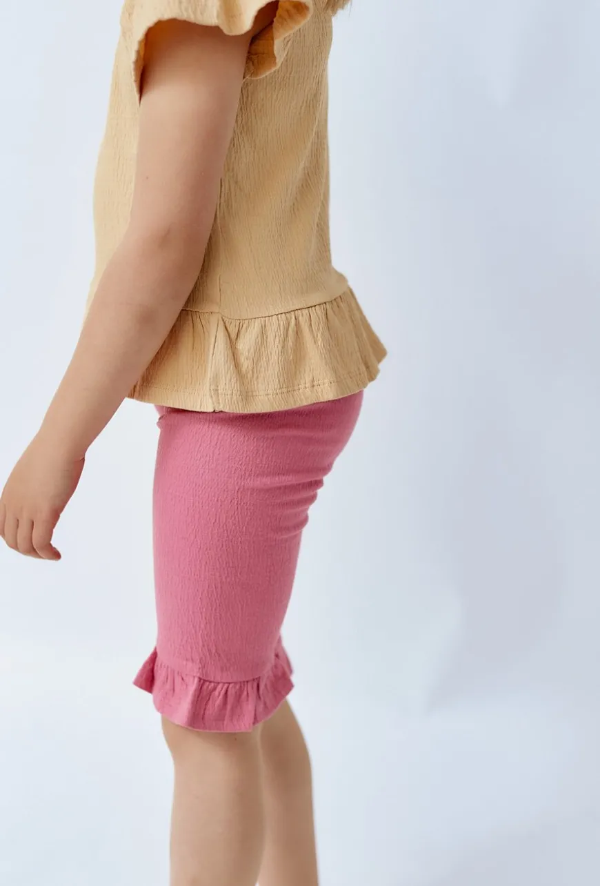 Legginsy dziewczęce na lato - różowe z falbanką