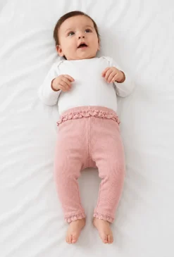 Legginsy niemowlęce z falbanką i koronkowym wykończeniem