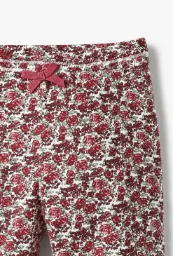 Legginsy niemowlęce z kwiatowym nadrukiem i kokardką