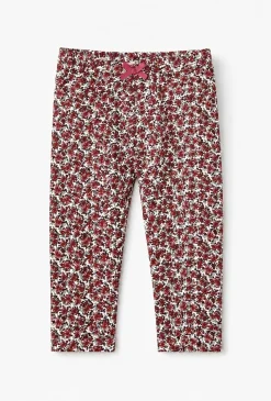 Legginsy niemowlęce z kwiatowym nadrukiem i kokardką