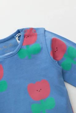 Niebieskie body niemowlęce z nadrukiem all over print w kwiatki