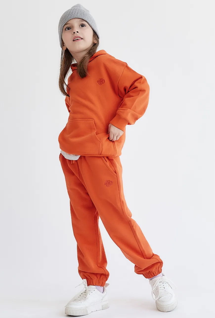 Pomarańczowe spodnie dresowe - unisex - Limited Edition