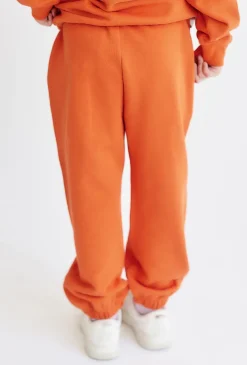 Pomarańczowe spodnie dresowe - unisex - Limited Edition