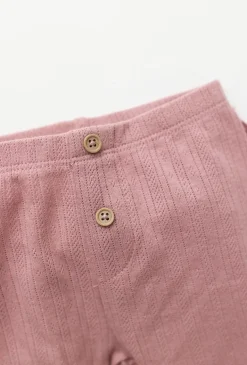 Różowe legginsy niemowlęce pointelle z falbanką