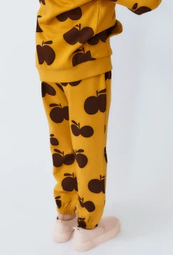 Spodnie dresowe z nadrukiem jabłek - Limited Edition