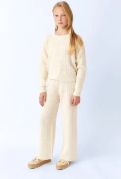 Sweter dziewczęcy ecru z dekoracyjnym splotem